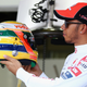 Illustration for article titled Lewis Hamilton goes to Brazil in a Senna helmet
